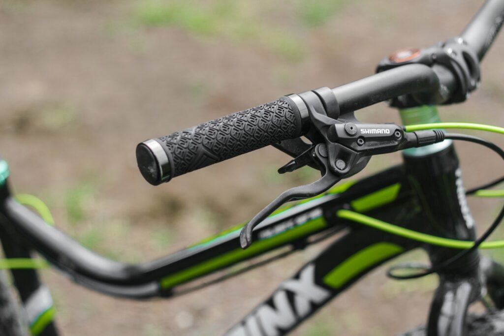 A Close Up Picture of Brakes and Handle Bar